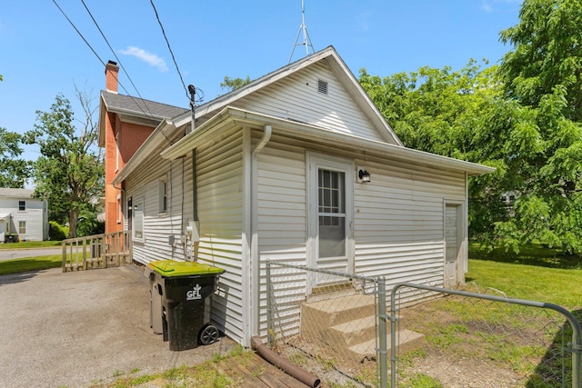 408 E Main St, Butler, IN 46721 - view of side of home with a chimney