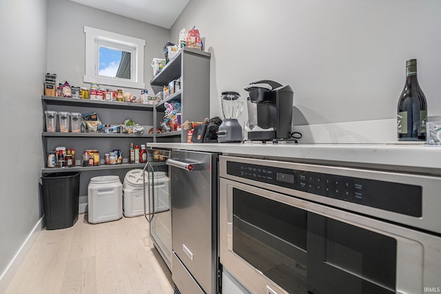 18419 Donegal Dr, South Bend, IN 46637 - kitchen featuring light wood finished floors, oven, and open shelves