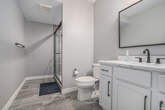 18419 Donegal Dr, South Bend, IN 46637 - bathroom with vanity, a shower stall, and marble finish flooring