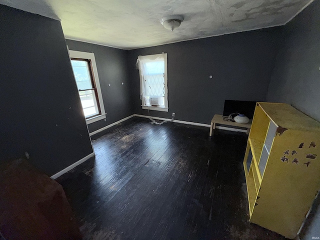 1800 High St, Logansport, IN 46947 - empty room with wood finished floors and cooling unit