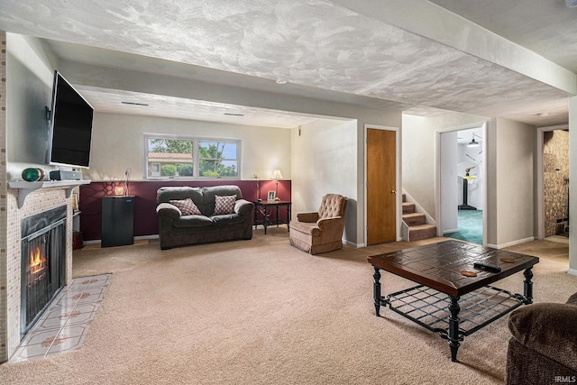 26946 Heather Ln, Elkhart, IN 46514 - living room with light carpet, a fireplace, stairs, and a textured ceiling