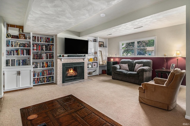 26946 Heather Ln, Elkhart, IN 46514 - carpeted living area featuring a fireplace