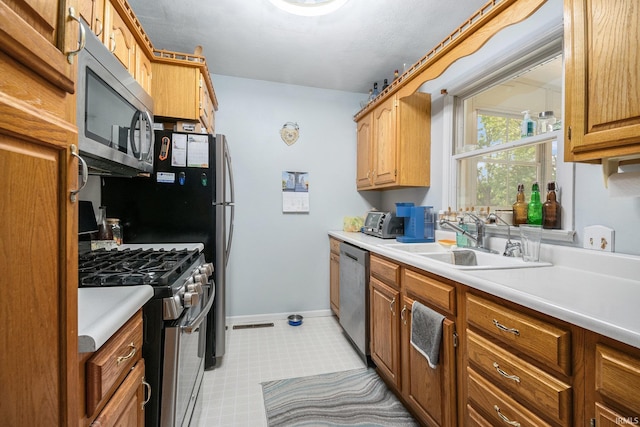 26946 Heather Ln, Elkhart, IN 46514 - kitchen with stainless steel appliances and light countertops