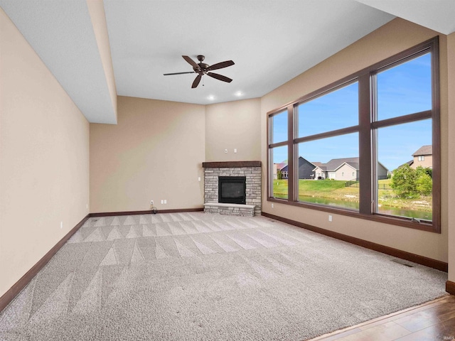 188 Begonia Ct, Fort Wayne, IN 46814 - unfurnished living room with a fireplace, ceiling fan, carpet floors, and recessed lighting