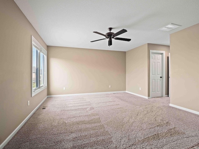 188 Begonia Ct, Fort Wayne, IN 46814 - spare room with ceiling fan and carpet floors