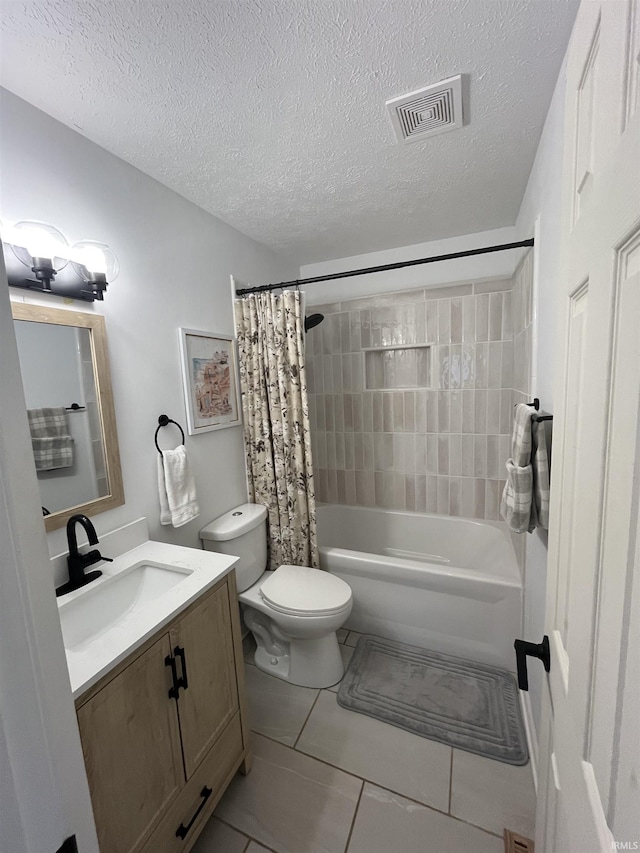 732 Conner Dr, Mishawaka, IN 46544 - bathroom with vanity, a textured ceiling, tile patterned floors, and shower / bath combo with shower curtain