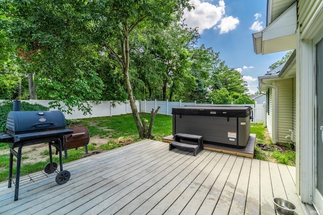 114 Whispering Ln, South Whitley, IN 46787 - deck featuring a hot tub, area for grilling, and a fenced backyard