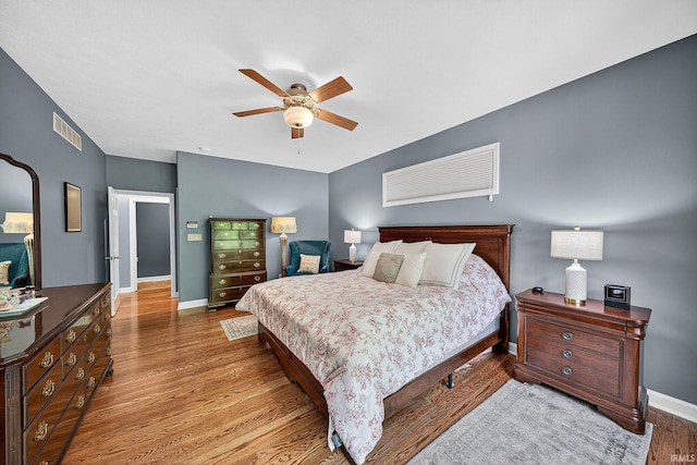 51733 Copperfield Rdg, Granger, IN 46530 - bedroom with wood finished floors and a ceiling fan
