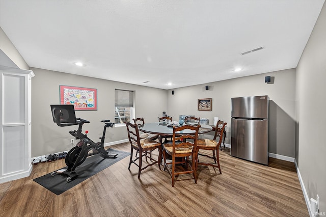 51733 Copperfield Rdg, Granger, IN 46530 - dining space with wood finished floors and recessed lighting