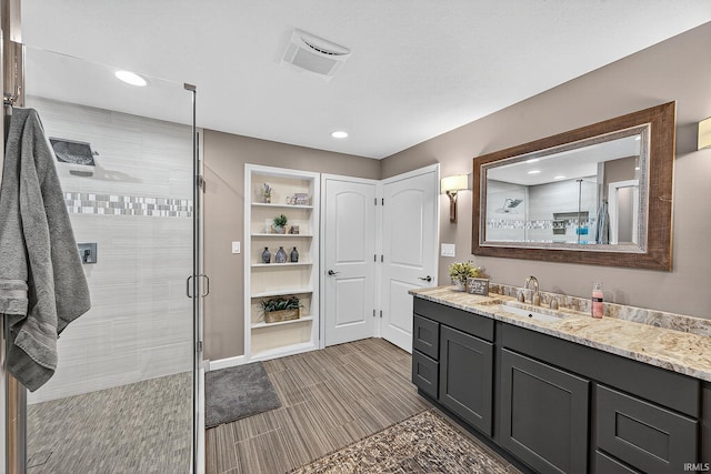 51733 Copperfield Rdg, Granger, IN 46530 - full bath featuring vanity, a stall shower, and recessed lighting