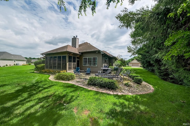 51733 Copperfield Rdg, Granger, IN 46530 - back of house featuring a patio, a sunroom, a chimney, and a lawn