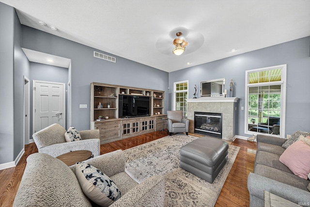 51733 Copperfield Rdg, Granger, IN 46530 - living room with ceiling fan, a fireplace, wood finished floors, and recessed lighting