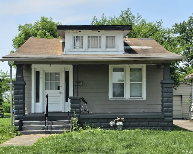 1812 Hercules Ave, Evansville, IN 47711 - bungalow-style home with a porch and a shingled roof