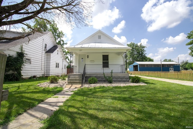 827 W Elm St, Union City, IN 47390 - shotgun-style home with covered porch