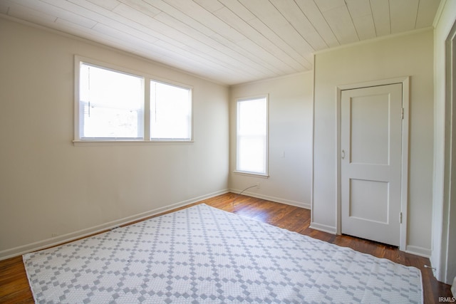 827 W Elm St, Union City, IN 47390 - unfurnished room with wooden ceiling, dark wood-style flooring, and crown molding