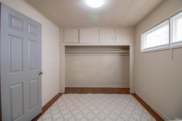 827 W Elm St, Union City, IN 47390 - unfurnished bedroom with dark wood-type flooring and ornamental molding
