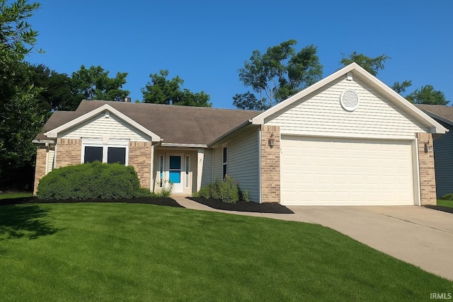 2220 Bobolink Dr, West Lafayette, IN 47906 - single story home featuring brick siding, a front lawn, and concrete driveway
