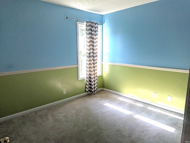 2220 Bobolink Dr, West Lafayette, IN 47906 - carpeted empty room featuring baseboards and a textured ceiling