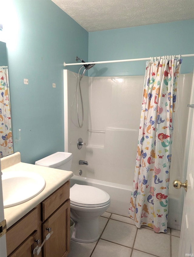 2220 Bobolink Dr, West Lafayette, IN 47906 - bathroom featuring vanity, tile patterned flooring, shower / bath combination with curtain, and a textured ceiling