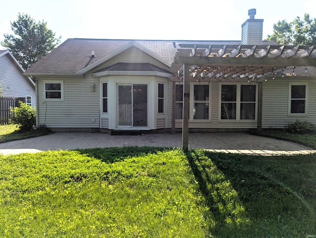 2220 Bobolink Dr, West Lafayette, IN 47906 - back of house with a pergola, a patio, and a chimney
