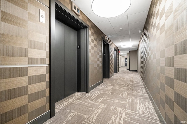 203 E Berry St Unit 1507, Fort Wayne, IN 46802 - hallway featuring elevator and wallpapered walls