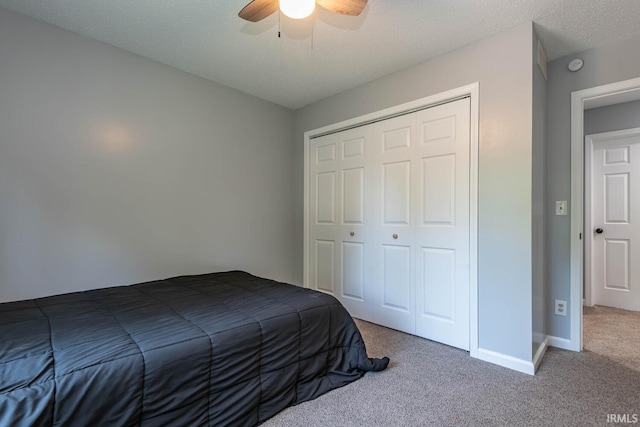 3523 S Tulip Ave, Bloomington, IN 47403 - bedroom with carpet flooring, a closet, and a ceiling fan