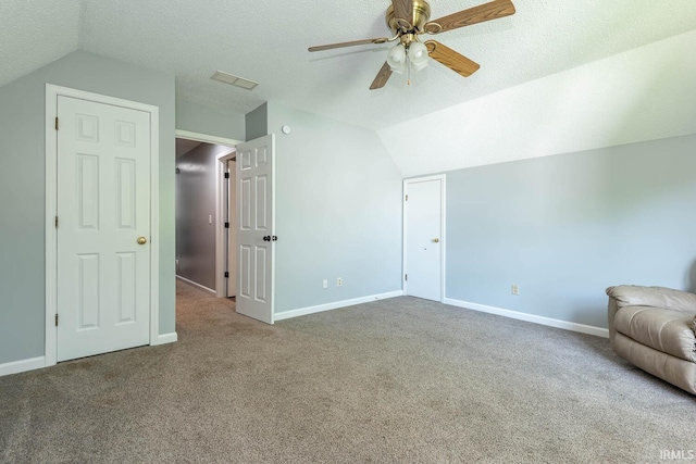 3523 S Tulip Ave, Bloomington, IN 47403 - additional living space featuring lofted ceiling, carpet, ceiling fan, and a textured ceiling
