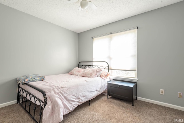 3523 S Tulip Ave, Bloomington, IN 47403 - carpeted bedroom featuring a textured ceiling and ceiling fan