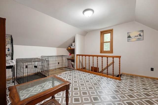 315 Mill St, Geneva, IN 46740 - additional living space featuring lofted ceiling and baseboards