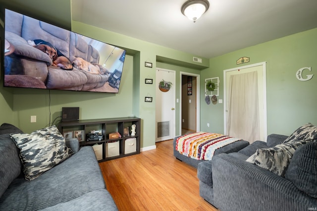 315 Mill St, Geneva, IN 46740 - living area featuring wood finished floors and baseboards