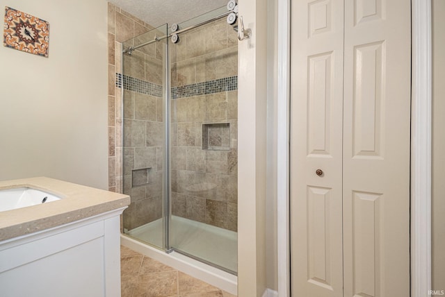 54410 Pleasant Valley Dr, Osceola, IN 46561 - full bath featuring a shower stall, a closet, vanity, and tile patterned floors