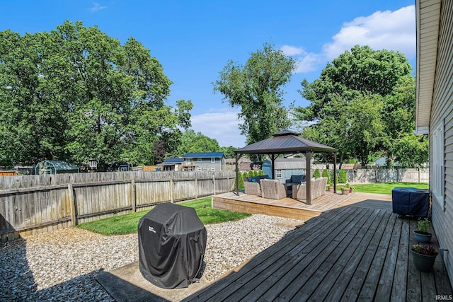 54410 Pleasant Valley Dr, Osceola, IN 46561 - wooden terrace featuring grilling area, a gazebo, a fenced backyard, and an outdoor hangout area