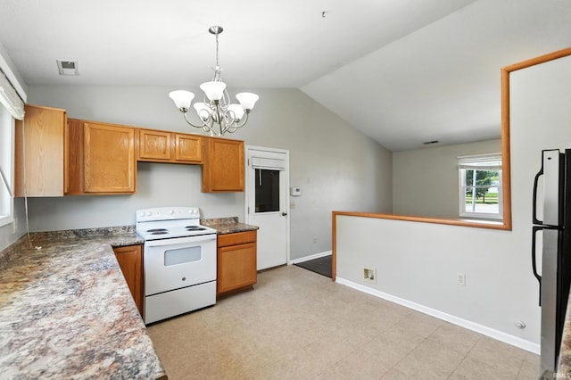 806 Deer Ridge Xing, Auburn, IN 46706 - kitchen with white electric stove, freestanding refrigerator, vaulted ceiling, a chandelier, and decorative light fixtures