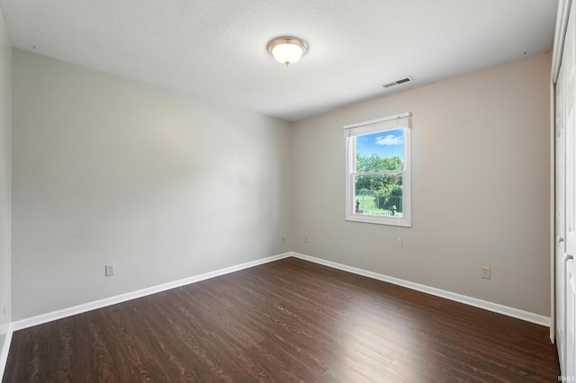 806 Deer Ridge Xing, Auburn, IN 46706 - empty room featuring dark wood finished floors