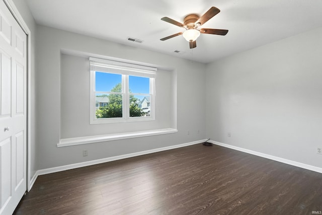 806 Deer Ridge Xing, Auburn, IN 46706 - spare room featuring dark wood-style flooring and ceiling fan