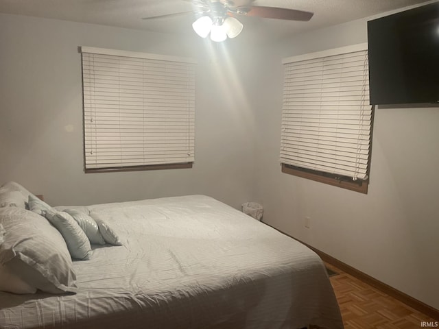 1074 Chapman Lake Dr, Warsaw, IN 46582 - bedroom with baseboards and a ceiling fan