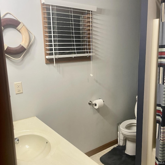 1074 Chapman Lake Dr, Warsaw, IN 46582 - bathroom featuring toilet and vanity