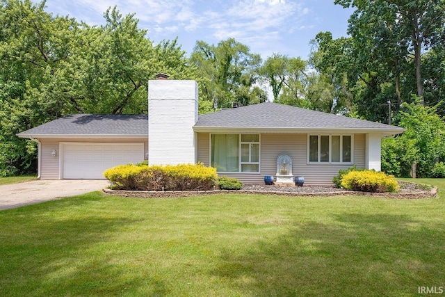 1760 Grant St, Elkhart, IN 46514 - single story home featuring a chimney, an attached garage, a front lawn, and driveway