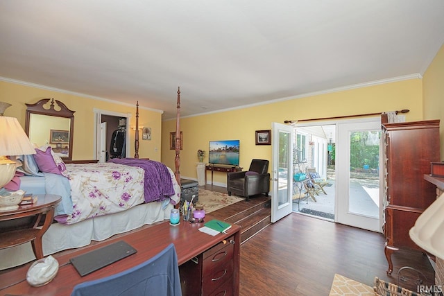 1760 Grant St, Elkhart, IN 46514 - bedroom featuring access to exterior, crown molding, dark wood-style flooring, a spacious closet, and a closet