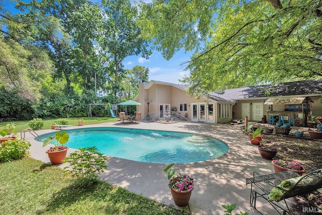 1760 Grant St, Elkhart, IN 46514 - outdoor pool featuring french doors and a patio