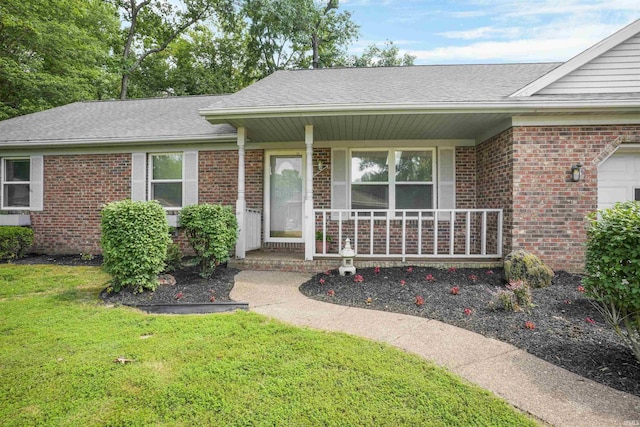 741 Christopher Dr, Evansville, IN 47711 - view of front of home featuring brick siding, a porch, a front lawn, and a shingled roof