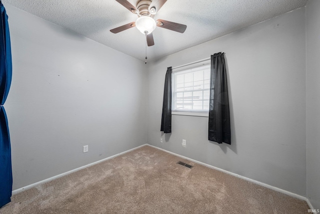 6701 Bittersweet Dr, Fort Wayne, IN 46825 - empty room featuring carpet flooring, a textured ceiling, and a ceiling fan