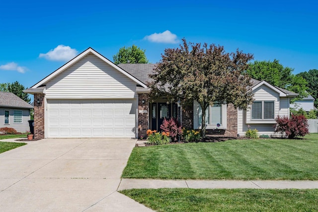 10414 Unita Dr, Fort Wayne, IN 46804 - single story home featuring brick siding, an attached garage, concrete driveway, and a front yard