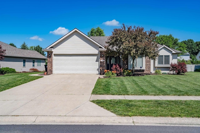 10414 Unita Dr, Fort Wayne, IN 46804 - ranch-style home with a garage, concrete driveway, a front lawn, and brick siding