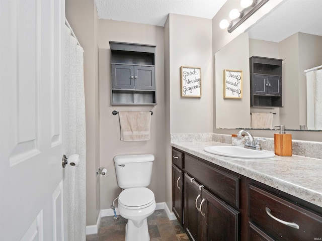 2479 Trillium Cv, Huntertown, IN 46748 - bathroom featuring vanity and stone finish flooring