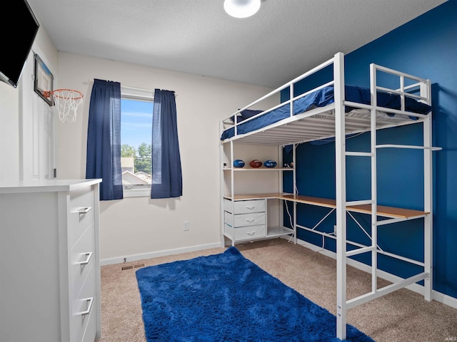 2479 Trillium Cv, Huntertown, IN 46748 - unfurnished bedroom featuring carpet flooring and a textured ceiling