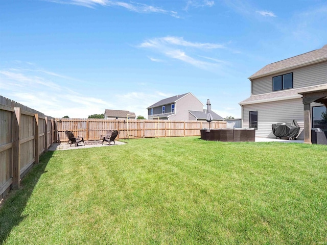 2479 Trillium Cv, Huntertown, IN 46748 - fenced backyard with an outdoor fire pit and a patio area
