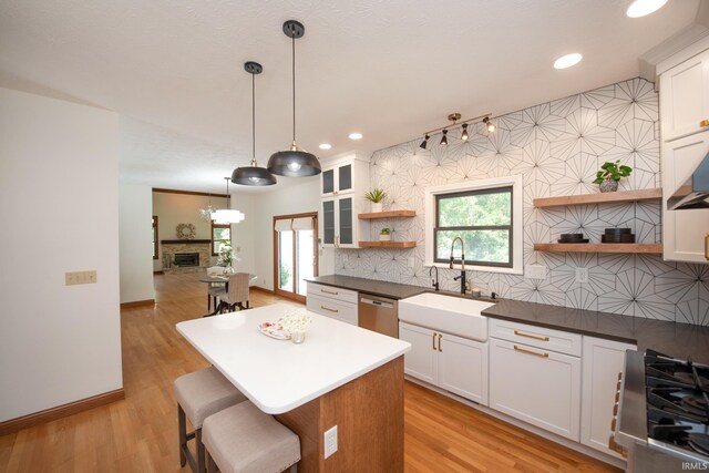 3827 Sunnycroft Pl, West Lafayette, IN 47906 - kitchen with open shelves, dishwasher, stove, plenty of natural light, and recessed lighting