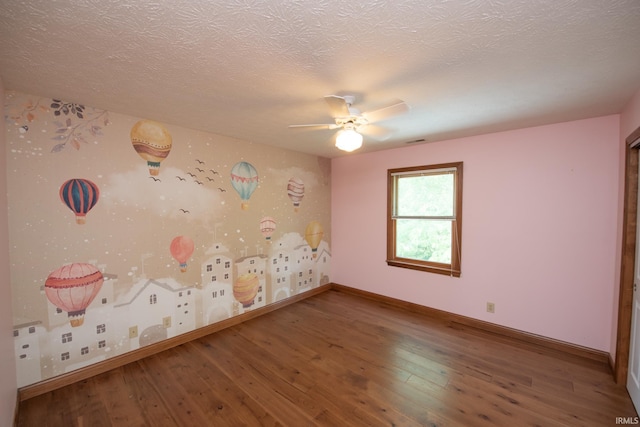3827 Sunnycroft Pl, West Lafayette, IN 47906 - empty room featuring wood-type flooring, a ceiling fan, and a textured ceiling