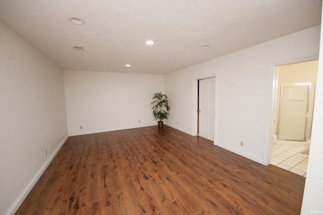 3827 Sunnycroft Pl, West Lafayette, IN 47906 - spare room featuring dark wood-style flooring and recessed lighting